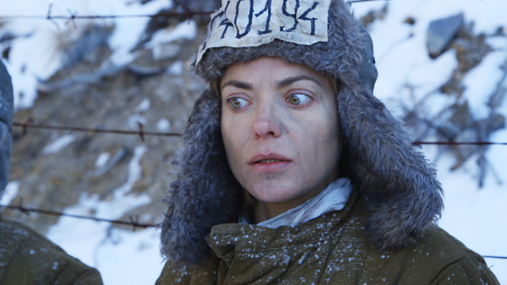Lana Gulevich as ANASTASTIA in the Gulag camp.